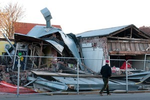 Shops in Opawa were among dozens of Christchurch buildings that suffered more critical damage after today's earthquake. Photo / NZPA/David Alexander