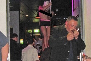 Part-naked strippers inside Calendar Girls could be seen from the Pitt St footpath. Photo / Supplied