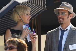 Kylie Bax and her husband, Spiros Poros, have two daughters and are expecting another girl. Photo / Getty Images