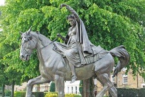 Statue of a fine lady upon a white horse at Banbury Cross, Oxfordshire. Photo / Jim Eagles