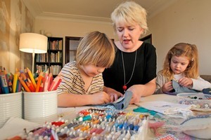 Hugo Heaphy, Philippa Burnham and Imogen Pearce get into some craft work at Seven Sisters Sewing Room, Westmere. Photo / Steven McNicholl