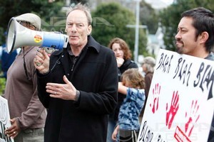 Protesters outside the venue where former British Prime Minister Tony Blair speaks to an audience during his speaking tour, Eden Park, Auckland. Photo / NZPA