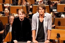 Jeremy Wells with the NZSO and its conductor Pietari Inkinen. Photo / Olivia Taylor 