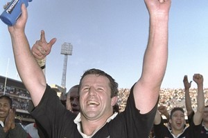 Sean Fitzpatrick celebrates after the 1996 All Blacks won a historic series in South Africa. Photo / Dave Rogers/Allsport