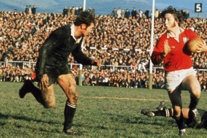 J.P.R Williams of the British Lions takes on New Zealand's Ian Kirkpatrick during a test match on the British Lions Tour to New Zealand in 1971. Photo / Getty Images