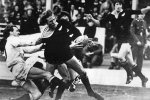 Bruce Robertson about to score one of the All Blacks' five tries against Combined Services during the UK Tour in 1978. Photo / NZ Herald Archives