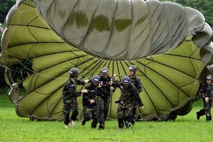South Korean teenagers participate in a warfare exercise as part of the Special Warfare Command's training course at a military base in Seoul, South Korea. Photo / Getty Images
