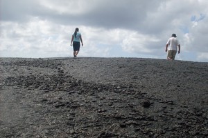 Walking across the Lava Fields left by the eruptions of Mt Matavanu between 1905 to 1911. Photo / Vaimoana Tapaleao