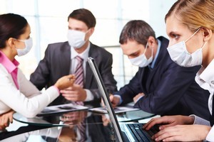 I spent fifteen years working in open-plan offices and would cringe every time someone turned up to work despite being visibly and audibly unwell. Photo / Thinkstock