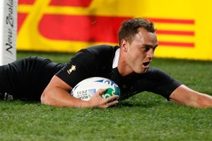 Israel Dagg scores a try in the opening Rugby World Cup match against Tonga. Photo / Brett Phibbs