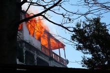 Firefighters are battling a blaze at a three story central Wellington apartment. Photo / Adam Errington Firefighters are battling a blaze at a three story central Wellington apartment. Photo / Adam Errington