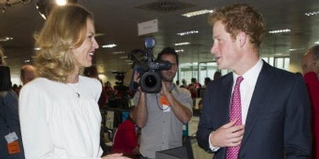 Czech model Eva Herzigova with Prince Harry on the trading floor as he attends BGC Partners' Charity Day in London. Czech model Eva Herzigova with Prince Harry on the trading floor as he attends BGC Partners' Charity Day in London.