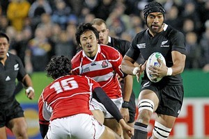 Victor Vito deflects Japanese players. Photo / Christine Cornege