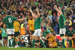 Tom Court (C) of Ireland celebrates victory with team mates. Photo / Getty Images