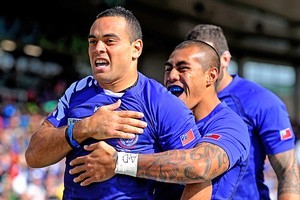 Samoa's Kahn Fotuali'i and Tusi Pisi. Photo / Getty Images