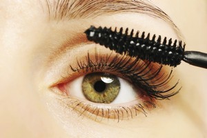 Makeup artist Eric Schmidt-Mohan advises using the brush like a comb going from the root of the eyelash to the tip. This is preferable to using a jerky motion along the arch of lashes. Photo / Thinkstock