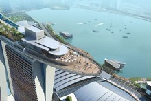 The Marina Bay Sands resort includes a hotel made up of three 55-storey towers, topped off with what looks like a curved ocean liner full of gardens, restaurants and pools. Photo / Supplied 