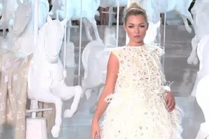 Kate Moss walked in the Louis Vuitton show at Paris Fashion Week. Photo / AFP