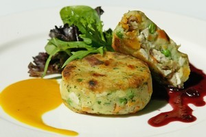 Turkey ham potato cake with pumpkin dressing and cranberry sauce. Photo / Richard Robinson