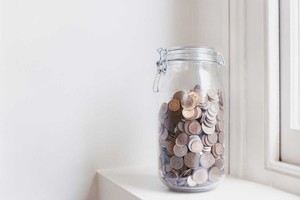The lid is being turned a little tighter to stop some previously invisible KiwiSaver fees escaping the jar unnoticed. Photo / Thinkstock