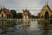 A Buddhist temple on the banks of Chaopraya River in Bangkok is surrounded by floodwaters as Thailand experiences its worst flooding in half a century. Photo / AFP