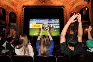 NZ supporters in the Hastings Fanzone at the Hawkes Bay Opera House cheer at the final whistle as NZ win the second Rugby World cup semi-final. Photo / Hawkes Bay Today