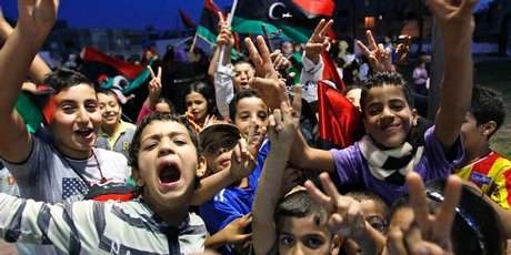 Libyan children celebrate the death of Muammar Gaddafi. Photo / AP