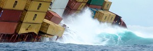 A huge wave slams into the starboard side of Rena, weakening further her already cracked hull. Photo / Katie Cox Rena spill: Our desperate salvage mission