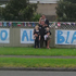The Lowe family pose by their All Blacks sign on Great South Road in Papakura as they show support for the boys. Photo / Nigel Lowe