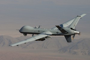 In a dehumanised form of warfare, Predator drones are piloted by computer in the US to fire missiles at targets in real-time. Photo / AP