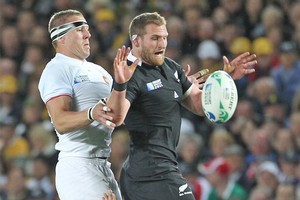 All Black Kieran Read wins lineout ball ahead of France's Imanol Harinordoquy. Photo / Paul Estcourt