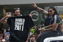 Piri Weepu (L) and Ma'a Nonu salute the thousands of people who turned out to view the All Blacks' Rugby World Cup victory parade. Photo / Troy Rawhiti-Forbes Piri Weepu (L) and Ma'a Nonu salute the thousands of people who turned out to view the All Blacks' Rugby World Cup victory parade. Photo / Troy Rawhiti-Forbes