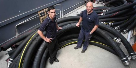 Marty Bourke and John Kelly of Hose Supplies have been
busy supplying Rena salvors with equipment. Photo / Joel Ford, Bay of Plenty Times Marty Bourke and John Kelly of Hose Supplies have been
busy supplying Rena salvors with equipment. Photo / Joel Ford, Bay of Plenty Times