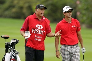 Golfer Adam Scott may be forced to sack Kiwi caddie Steve Williams after he publicly made racist remarks about former boss Tiger Woods. Photo / Getty Images