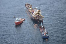The Go Canopus and the Awanuia continued to recover oil from the Rena yesterday. Photo / LOC
