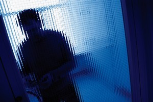 Three masked men forced their way in to the victims' home. Photo / Thinkstock
