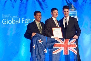 Chris Clay, centre, receiving his award from (l) Anthony Salcito - Vice President, Education Microsoft and Kapil Wadhera, General Manager, Intel. Photo / Supplied