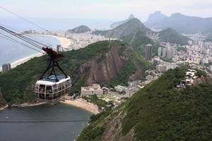 The cable-cars which link Rio de Janeiro's suburbs to the volcanic pegs of Morro da Urca and Morro do Pao de Acucar (better today as the Sugar Loaf), were the brainchild of engineering professor Augusto Ferreira Ramos. Photo / Thinkstock