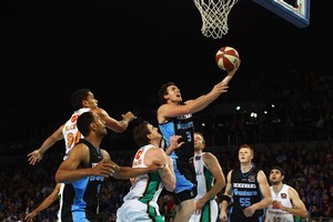 Breaker Daryl Corletto lays the ball up against the Townsville Crocodiles at Vector Arena last night. Photo / Getty Images