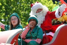 Last year the Auckland Santa Parade was enjoyed by large crowds. Photo / Greg Bowker 