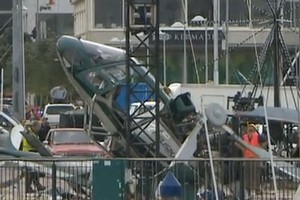 The helicopter crashed this morning while setting up for the installation of a christmas tree. Photo / TVNZ
