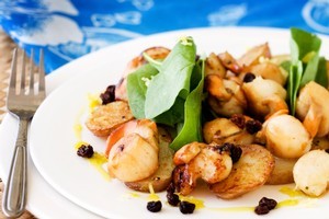 Scallops with potatoes and lemon oil. Photo / Babiche Martens