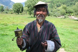 A man holds his prayer wheel. Photo / Jill Worrall