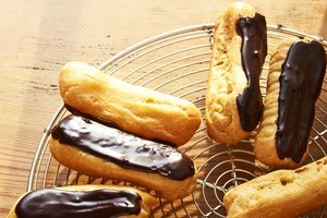 The recipe for these chocolate eclairs can be found in The Art of French Baking. Photo / Supplied