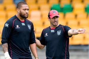 Former rugby league player Andrew Johns gives instruction to Manu Vatuvei. Photo / Dean Purcell