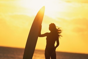 Take the golden opportunity to pick up surfing this summer. Photo / Thinkstock