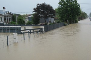 Flooded streets in the Nelson region. Photo / Tessa McBride
