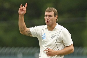 Doug Bracewell of New Zealand celebrates taking the wicket of Ricky Ponting of Australia. Photo / Getty Images
