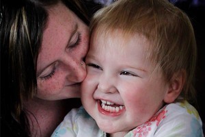 Tayler Gailey, 2, with mother Lisa, is going to Mexico for alternative treatment. Picture / Christine Cornege