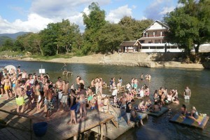 Tourists tubing down the river in Vang Viang, Laos. Photo / Charlotte Whale